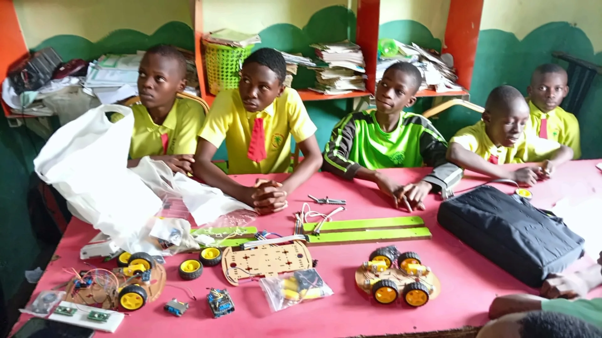 Fruitful Trees pupils working with robotics kits during a practical lesson.